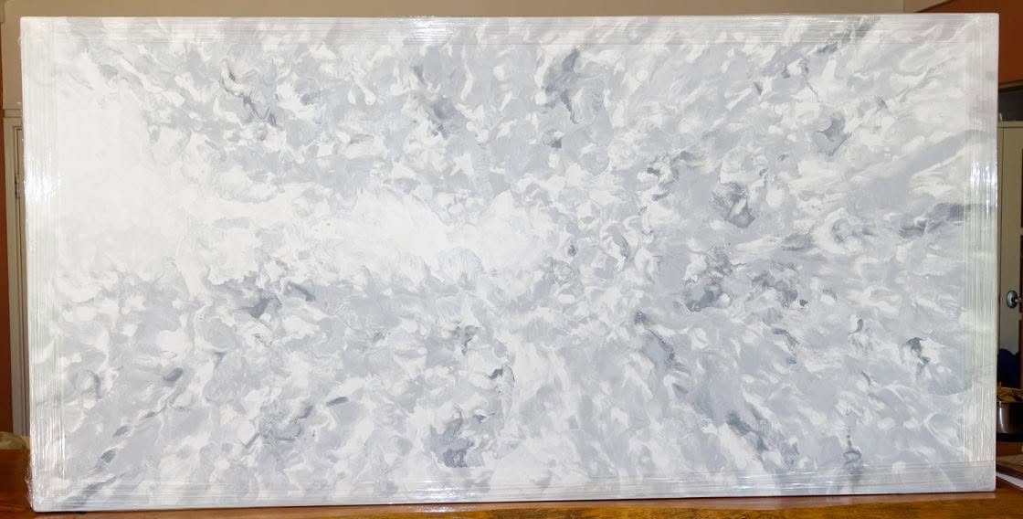 Large abstract painting in swirling white and soft grey tones
