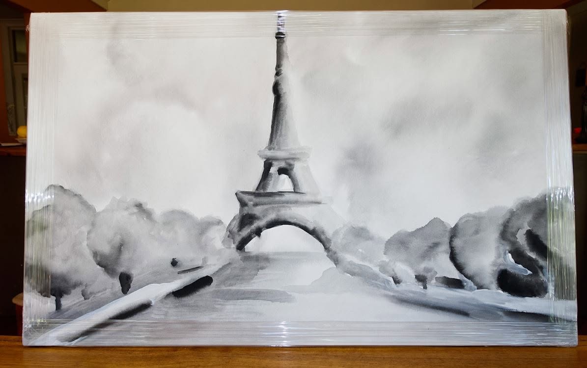 Black and white ink wash painting of the Eiffel Tower framed by trees